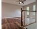 Bright and spacious living area featuring hardwood floors, neutral walls, and a ceiling fan at 4232 Chickasaw Trl, Douglasville, GA 30135