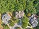 Aerial view of the house with a large, private backyard at 8355 Ainsworth Dr, Cumming, GA 30041