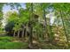 Spacious back porch overlooks a lush, wooded lot at 8355 Ainsworth Dr, Cumming, GA 30041