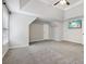 Large main bedroom boasts a trey ceiling, plush carpeting, and a wall-mounted TV at 8355 Ainsworth Dr, Cumming, GA 30041