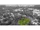 Bordered property lines highlight the area's lush, green landscape at 159 Forest Ave, Social Circle, GA 30025