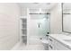 Modern bathroom featuring white walls, a shower/tub, and white vanity and shelving at 159 Forest Ave, Social Circle, GA 30025