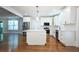 Bright kitchen with quartz countertops, stainless steel appliances, and center island at 159 Forest Ave, Social Circle, GA 30025
