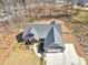 An aerial view of the home showing the roofline and surrounding landscape at 1847 Davis Mill Rd, Dallas, GA 30157