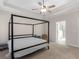 Bedroom featuring a four-poster bed and access to en-suite bathroom at 1847 Davis Mill Rd, Dallas, GA 30157