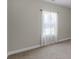 A well-lit bedroom features a window with sheer curtains, offering privacy and natural light at 1847 Davis Mill Rd, Dallas, GA 30157