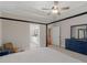 Spacious primary bedroom with en-suite bathroom and dresser at 1847 Davis Mill Rd, Dallas, GA 30157