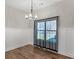 This dining area has hardwood floors and wainscotting at 1847 Davis Mill Rd, Dallas, GA 30157
