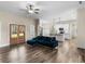 Bright living space featuring hardwood floors, double doors to the backyard, and an adjacent eat-in kitchen at 1847 Davis Mill Rd, Dallas, GA 30157