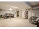 Finished basement with carpeted floors, a large open area, and a closet for plenty of storage at 2101 Kinridge Rd, Marietta, GA 30062