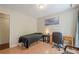 Bedroom with hardwood floors, desk, and a comfortable place to relax at 2101 Kinridge Rd, Marietta, GA 30062