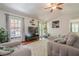 Inviting living room with hardwood floors, vaulted ceilings and sliding glass doors to the back patio at 2101 Kinridge Rd, Marietta, GA 30062