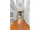 Bright foyer with hardwood floors, soaring ceilings, and abundant natural light at 2443 High Meadows Ct, Conyers, GA 30094