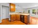 Functional kitchen with ample cabinetry, modern appliances, and a view to the living spaces at 2443 High Meadows Ct, Conyers, GA 30094