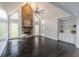 Bright living room with dark hardwood floors, fireplace, and built-in shelves at 275 Sageglen Rd, Lawrenceville, GA 30044