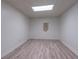 Finished room in basement featuring wood-look flooring, paneled walls, and recessed lighting at 275 Sageglen Rd, Lawrenceville, GA 30044