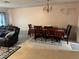Dining room featuring elegant chandelier, a plaid tablecloth, and comfortable seating at 6438 Wedgeview Dr, Tucker, GA 30084
