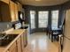 Eat-in kitchen area featuring a window-filled breakfast nook and neutral countertops at 6438 Wedgeview Dr, Tucker, GA 30084