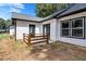 Backyard featuring a small stained wood patio at 2000 Grove Ave, East Point, GA 30344