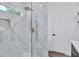 Modern bathroom featuring a glass-enclosed shower with tiled walls at 2000 Grove Ave, East Point, GA 30344