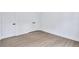 Bright room featuring hardwood floors and double door closet, great for storage at 2000 Grove Ave, East Point, GA 30344