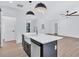 Kitchen featuring a center island with dishwasher and sink, along with modern stainless steel appliances at 2000 Grove Ave, East Point, GA 30344