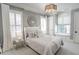 Inviting bedroom features plush bedding, a window seat, and stylish lighting at 3224 Lanier Ne Dr, Atlanta, GA 30319