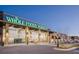 Exterior view of Whole Foods Market featuring large windows and modern design at 3224 Lanier Ne Dr, Atlanta, GA 30319