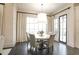 Bright dining area with large windows, elegant curtains, and comfortable seating arrangements at 3224 Lanier Ne Dr, Atlanta, GA 30319