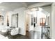 Elegant foyer with high ceilings, detailed trim, hardwood floors, and natural light throughout the home at 3224 Lanier Ne Dr, Atlanta, GA 30319