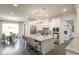 Spacious kitchen with a large center island, stainless steel appliances, and an adjacent dining area at 3224 Lanier Ne Dr, Atlanta, GA 30319