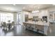 Bright kitchen with a large island, stainless steel appliances, custom cabinetry, and an adjacent dining area at 3224 Lanier Ne Dr, Atlanta, GA 30319