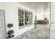 Covered porch with outdoor kitchen and seating at 3224 Lanier Ne Dr, Atlanta, GA 30319