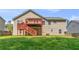 Spacious backyard with a two-story deck, providing ample room for outdoor entertaining at 6983 Pine Shadow Way, Winston, GA 30187