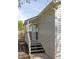 Side porch with gray deck, white railings, and access to the yard at 91 Chester Se Aly, Atlanta, GA 30316