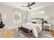 Comfortable bedroom featuring a ceiling fan, neutral decor, and natural light at 91 Chester Se Aly, Atlanta, GA 30316