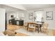 Open floor plan featuring a dining table and stylish kitchen with stainless steel appliances at 91 Chester Se Aly, Atlanta, GA 30316