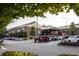 Outdoor view of Krog Street Market with parking area, trees, and red Jeep at 91 Chester Se Aly, Atlanta, GA 30316