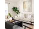 Bright living room features neutral furniture, modern decor, and stylish accents at 91 Chester Se Aly, Atlanta, GA 30316