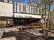 Exterior daytime shot of Three Taverns Imberatorium restaurant with outdoor seating at 91 Chester Se Aly, Atlanta, GA 30316