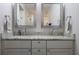 Bathroom with double vanity, granite counters, modern sinks and updated fixtures at 138 Elysian Nw Way, Atlanta, GA 30327