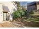 Charming home exterior with landscaped front yard, steps leading to the front door and mature bushes at 138 Elysian Nw Way, Atlanta, GA 30327