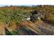 Charming home surrounded by lush trees, offering a serene and private setting on the golf course at 138 Elysian Nw Way, Atlanta, GA 30327