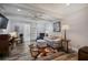 Inviting living room features a comfortable white sofa, ceiling fan, and stylish decor, perfect for relaxation at 138 Elysian Nw Way, Atlanta, GA 30327
