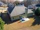 Aerial view of the backyard featuring a small patio with outdoor furniture at 2105 Rotunda Ct, Conyers, GA 30094