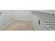 Walk-in closet with carpet and adjustable shelving, offering ample storage space at 2105 Rotunda Ct, Conyers, GA 30094