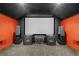 View of a home theater's large screen and a surround sound system for an immersive viewing experience at 2105 Rotunda Ct, Conyers, GA 30094