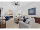 Inviting living room boasts stylish furnishings, a fireplace, and ample natural light for a warm ambiance at 2105 Rotunda Ct, Conyers, GA 30094