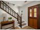 Inviting foyer with hardwood floors and a staircase leading to the second floor at 3021 Favor Pines Sw Ct, Marietta, GA 30060