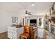 Bright living room featuring a stone fireplace, hardwood floors, and abundant natural light at 3021 Favor Pines Sw Ct, Marietta, GA 30060